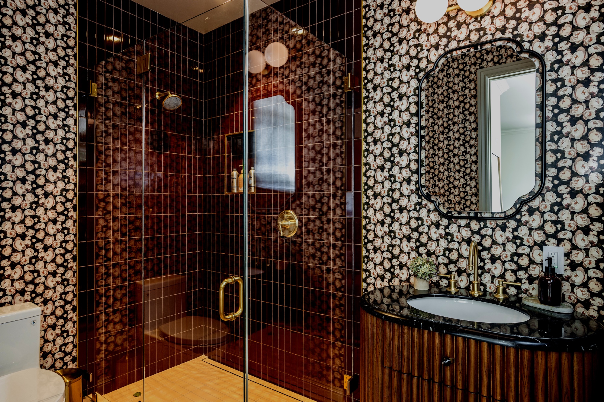 Dark tiled shower and vanity wall by M2