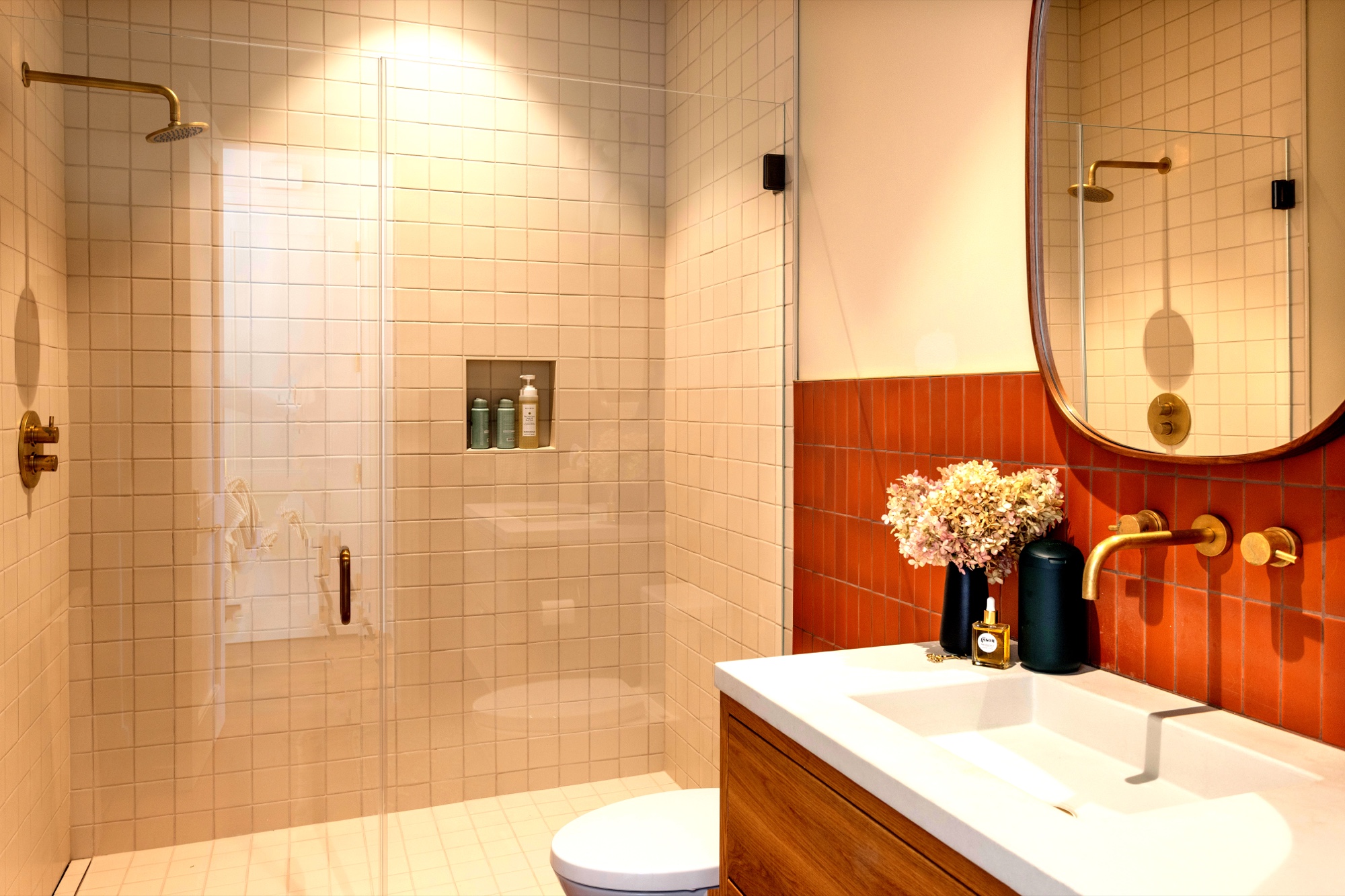 Bathroom vanity and tiled shower by M2