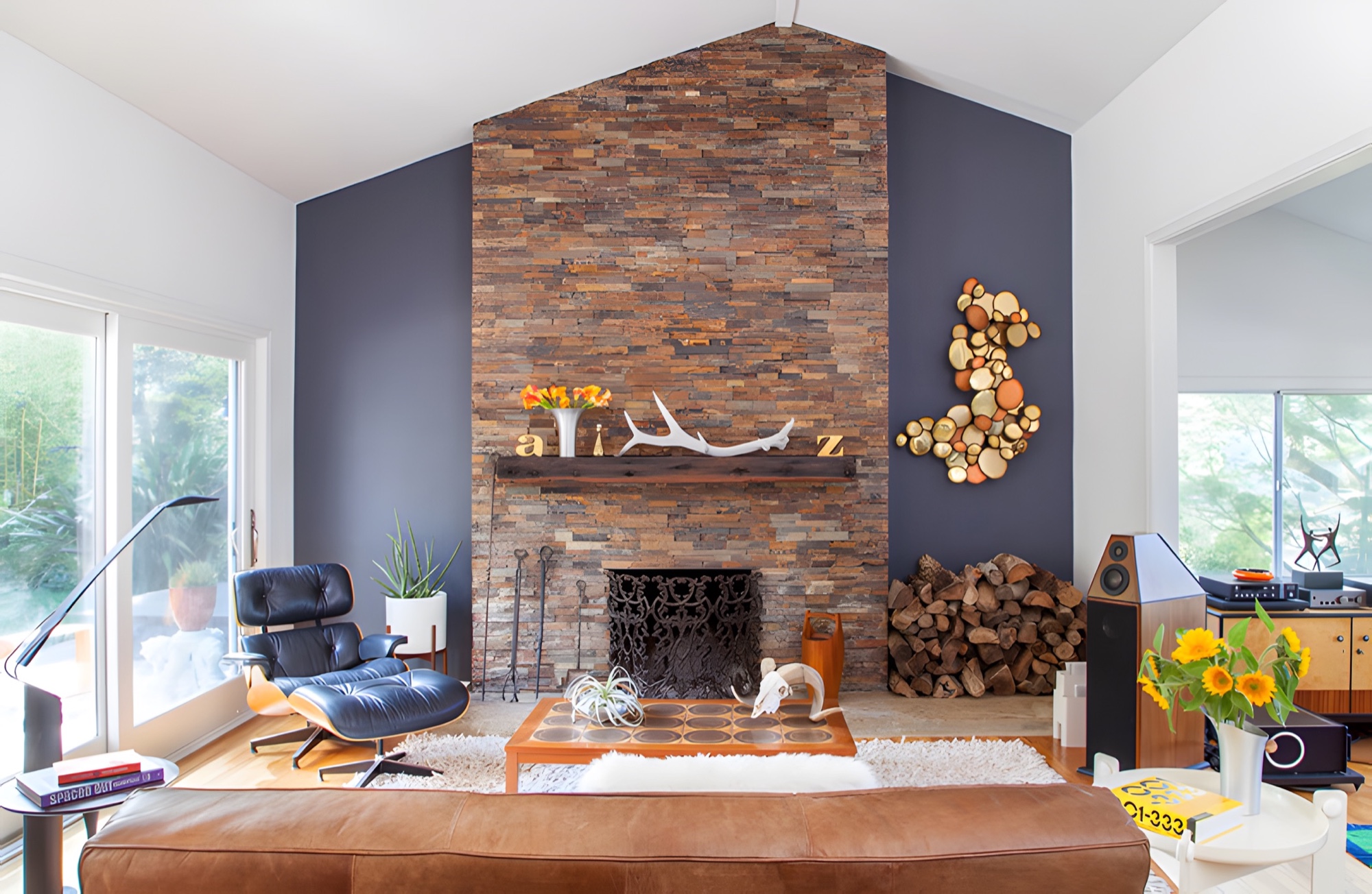 Finished indoor living space with fireplace and millwork by M2